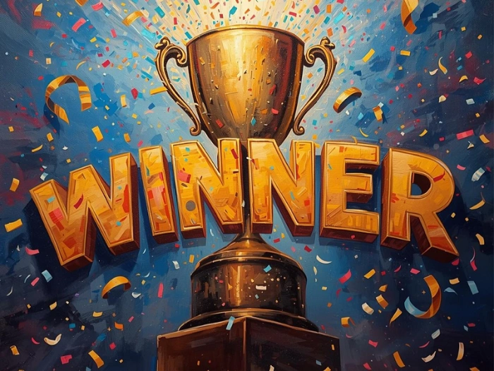 Zlatý pohár s nápisem WINNER a konfety ve vzduchu – symbol vítězství a radosti z FTF v geocachingu.