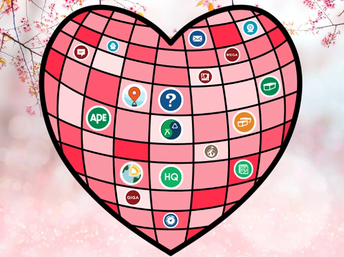 Srdce tvořené ikonami různých typů geocachingových keší symbolizující rozmanitost hry geocaching.